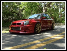 2003 Subaru Impreza with 18x9 Rota G-Force wheels