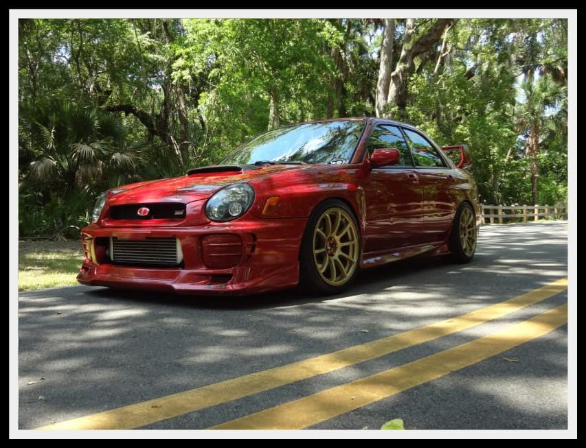 2003 Subaru Impreza with 18x9 Rota G-Force wheels