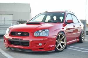 2004 Subaru Impreza with 18x9.5 Rota Grid wheels