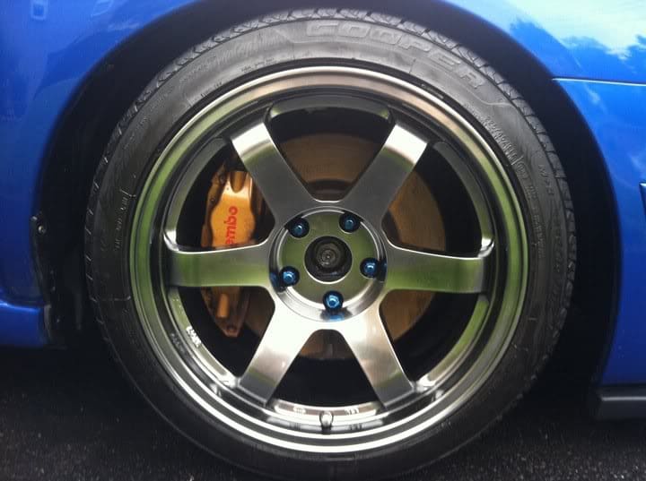 2008 Subaru Impreza with 17x9.5 Rota Grid wheels