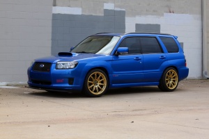 2008 Subaru Forester with 18x9.5 Rota T2R wheels