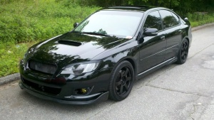 2008 Subaru Legacy with 18x8.5 Rota Grid wheels