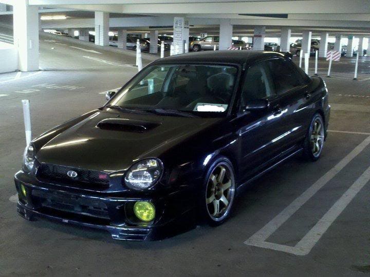 2003 Subaru Impreza with 18x8.5 Rota Grid wheels