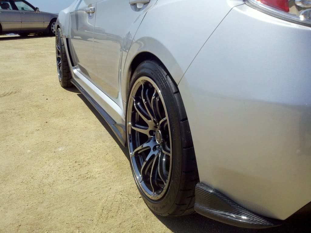 2010 Subaru Impreza with 18x9.5 Rota wheels