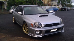 2003 Subaru Impreza with 17x8 Rota Boost wheels