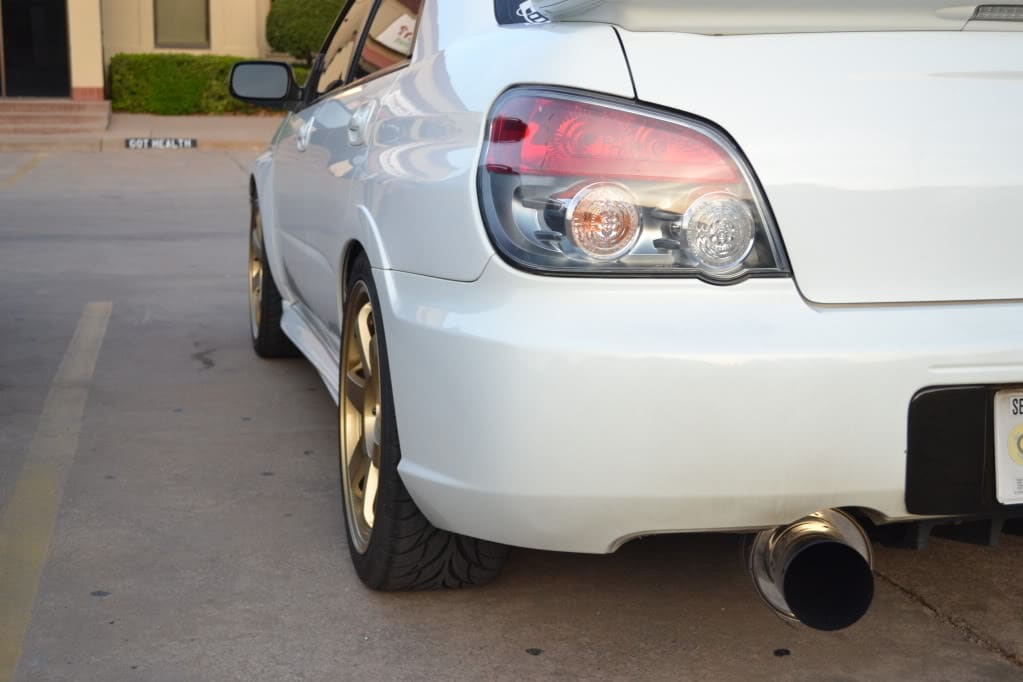 2006 Subaru Impreza with 18x8.5 Rota Grid wheels