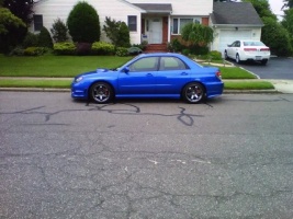 2006 Subaru Impreza with 17x9 Rota Grid wheels