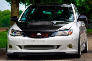 2009 Subaru Impreza with 18x9 Rota SVN wheels