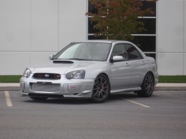 2004 Subaru Impreza with 18x8.5 Rota G-Force wheels