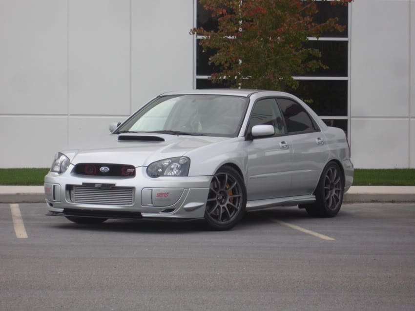 2004 Subaru Impreza with 18x8.5 Rota G-Force wheels