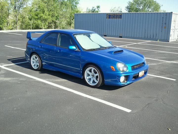 2003 Subaru Impreza with 17x9 Rota G-Force wheels