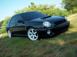 2003 Subaru Impreza with 17x9 Rota Grid wheels