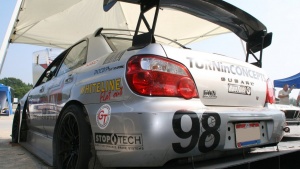 2005 Subaru Impreza with 18x10 Rota T2R wheels