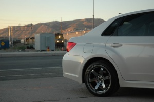 2009 Subaru Impreza with 18x9.5 Rota Grid wheels