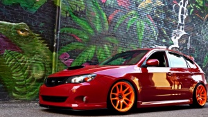 2010 Subaru Impreza with 18x9.5 Rota Torque-R wheels
