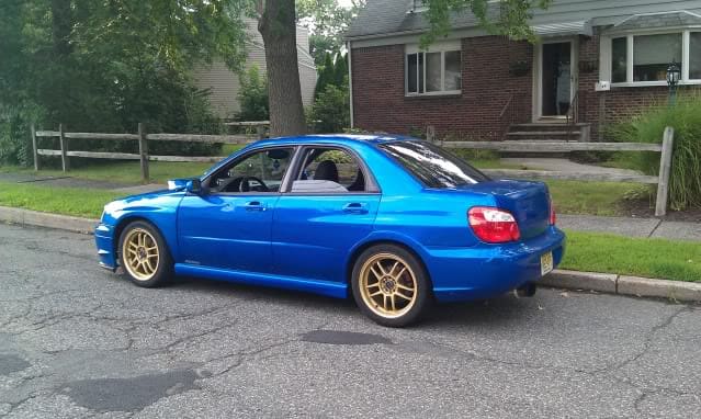 2004 Subaru Impreza with 17x7.5 Rota Subzero wheels