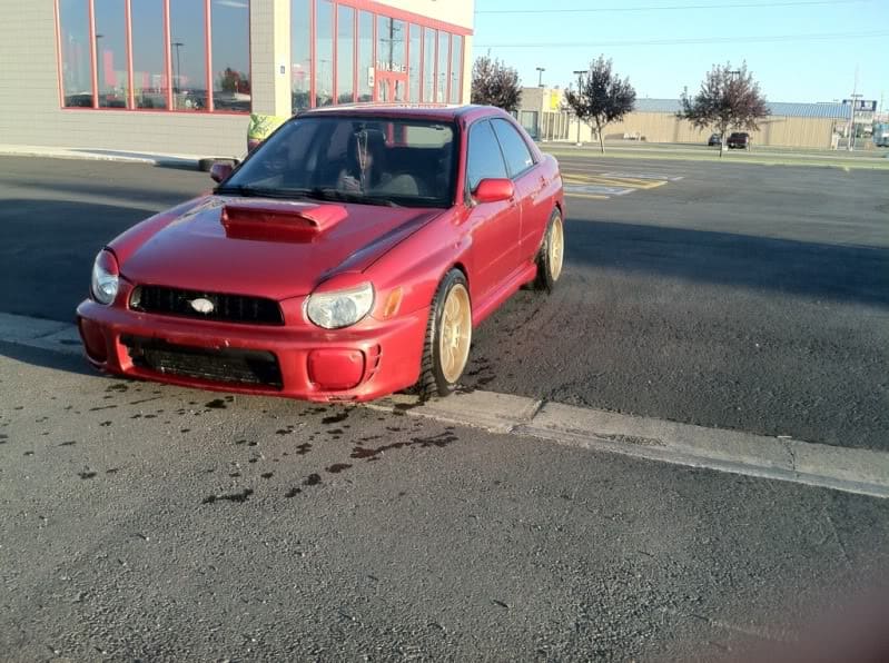 2003 Subaru Impreza with 18x9.5 Rota D-Force wheels