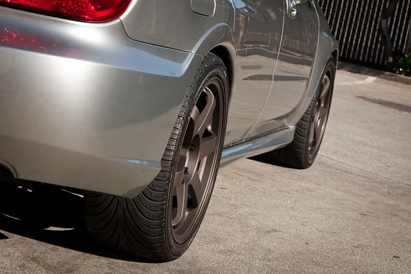 2007 Subaru Impreza with 18x8.5 Rota Grid wheels