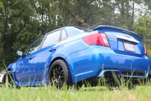 2011 Subaru Impreza WRX with 18x9.5 Rota D-Force wheels