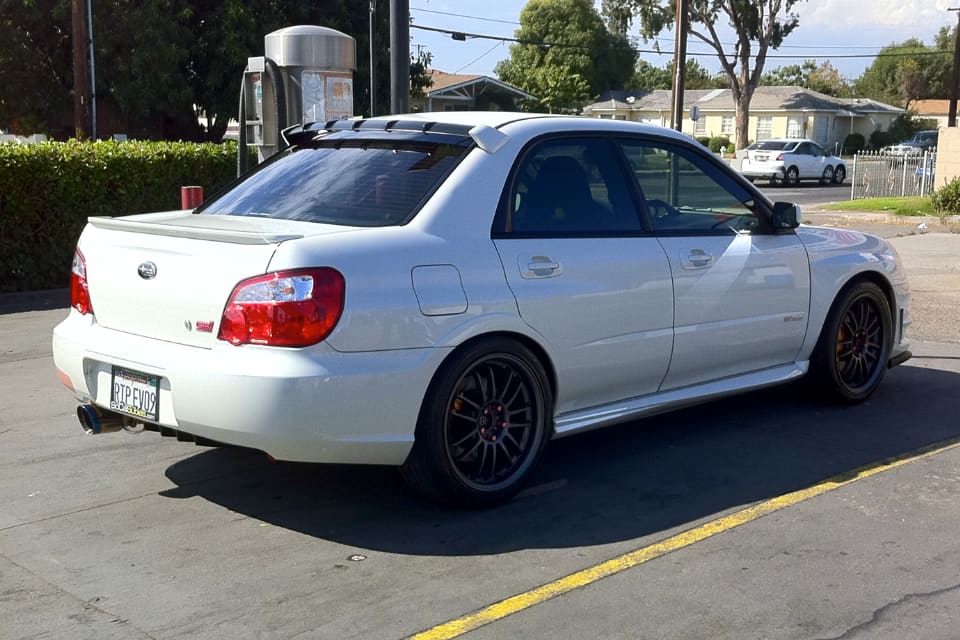2008 Subaru Impreza with 18x8.5 Rota SVN wheels