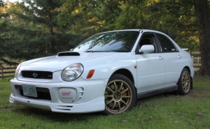 2003 Subaru Impreza with 17x8 Rota G-Force wheels