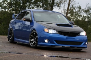 2008 Subaru Impreza with 18x9.5 Rota Grid wheels