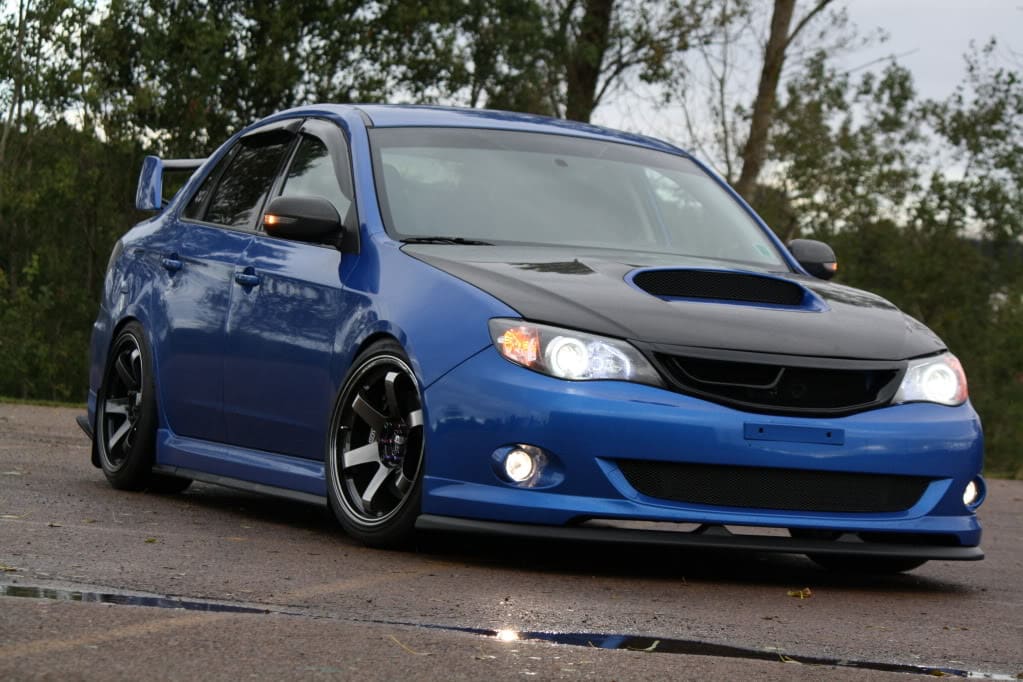 2008 Subaru Impreza with 18x9.5 Rota Grid wheels