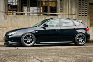 2009 Subaru Impreza with 18x9.5 Rota Boost 2 wheels