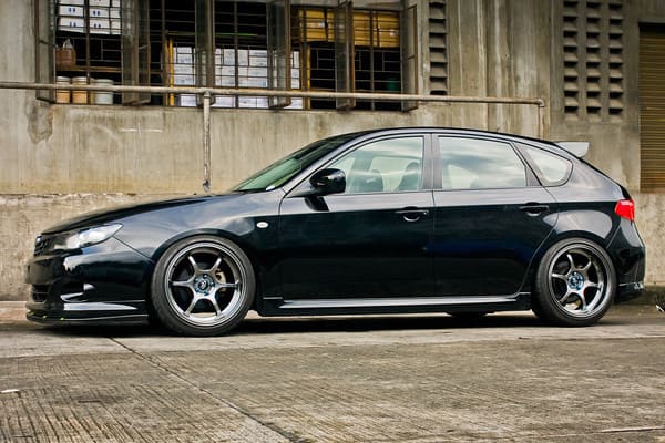 2009 Subaru Impreza with 18x9.5 Rota Boost 2 wheels