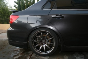 2011 Subaru Impreza with 18x9.5 Rota T2R wheels