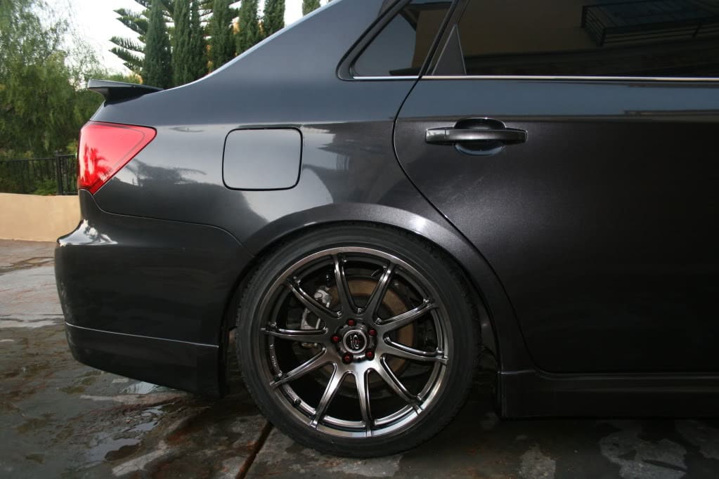 2011 Subaru Impreza with 18x9.5 Rota T2R wheels