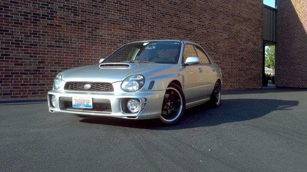 2003 Subaru Impreza with 17x7.5 Rota Grid wheels