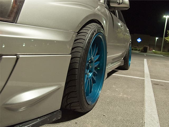 2005 Subaru Impreza with 18x10 Rota SVN-R wheels