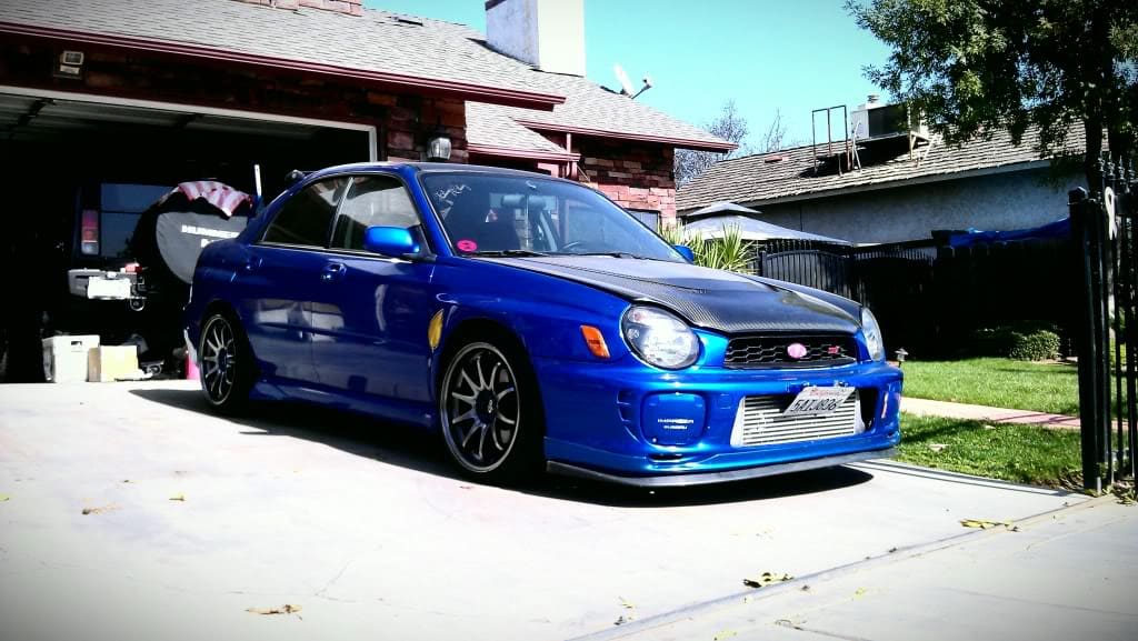 2003 Subaru Impreza with 18x9.5 Rota DPT wheels