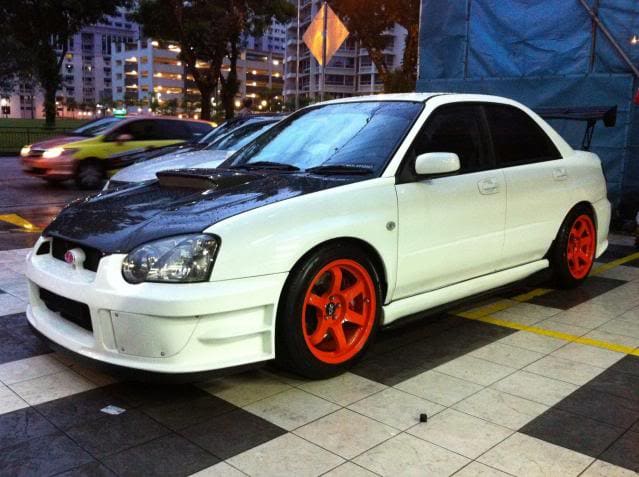 2004 Subaru Impreza with 17x9 Rota Grid wheels