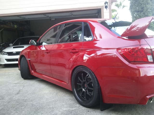 2010 Subaru Impreza with 18x9.5 Rota D-Force wheels