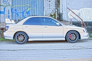 2003 Subaru Impreza with 17x8.5 Rota G-Force wheels