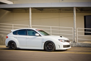 2008 Subaru Impreza with 18x9.5 Rota Boost 2 wheels
