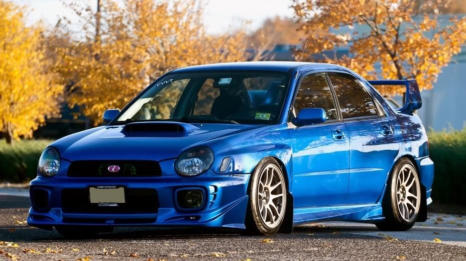 2003 Subaru Impreza with 17x9 Rota Torque wheels