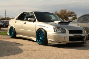 2004 Subaru Impreza with 18x10 Rota SVN-R wheels