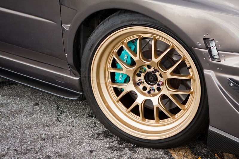 2004 Subaru Impreza with 18x9.5 Rota MXR wheels