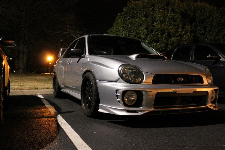 2003 Subaru Impreza with 18x10 Rota SVN-R wheels
