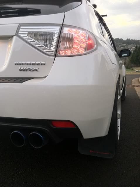 2011 Subaru Impreza WRX with 18x9.5 Rota Grid wheels