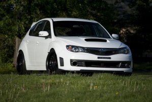 2008 Subaru Impreza with 18x10 Rota SVN-R wheels