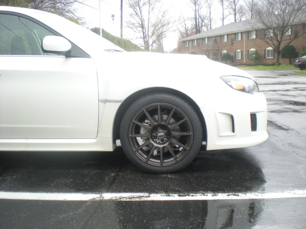 2011 Subaru Impreza WRX with 18x8.5 Rota Grid wheels
