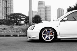 2003 Subaru Impreza WRX with 18x9.5 Rota Grid wheels