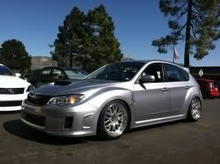 2011 Subaru Impreza WRX with 18x9.5 Rota MXR wheels