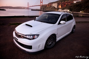 2011 Subaru Impreza WRX with 18x9.5 Rota MXR wheels