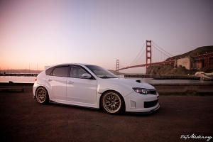 2011 Subaru Impreza WRX with 18x9.5 Rota MXR wheels