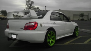 2006 Subaru Impreza with 18x9.5 Rota Grid wheels